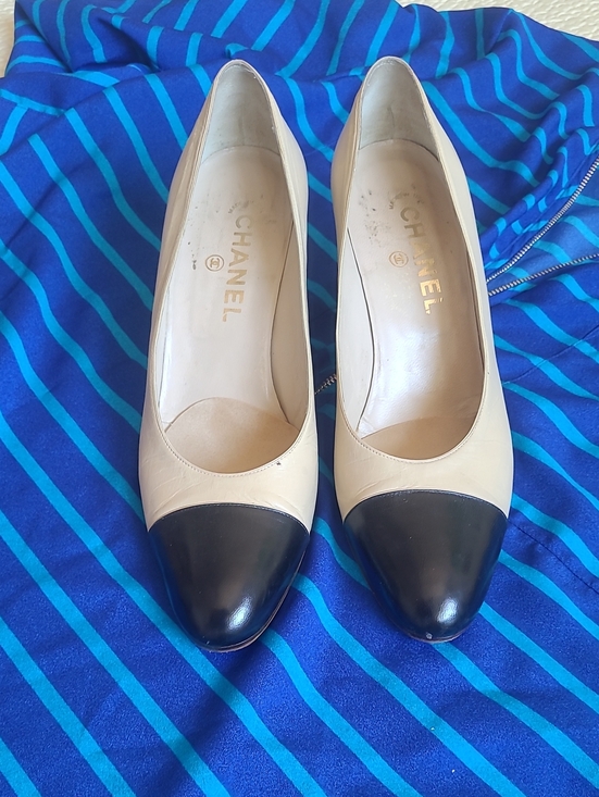 CHANEL Shoes - CHANEL Beige Leather Pumps with Black Cap Toe